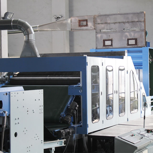 Carding machine setup for synthetic fiber processing